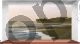 Window with cherry wood sill on the beach at sunset - Anonimo